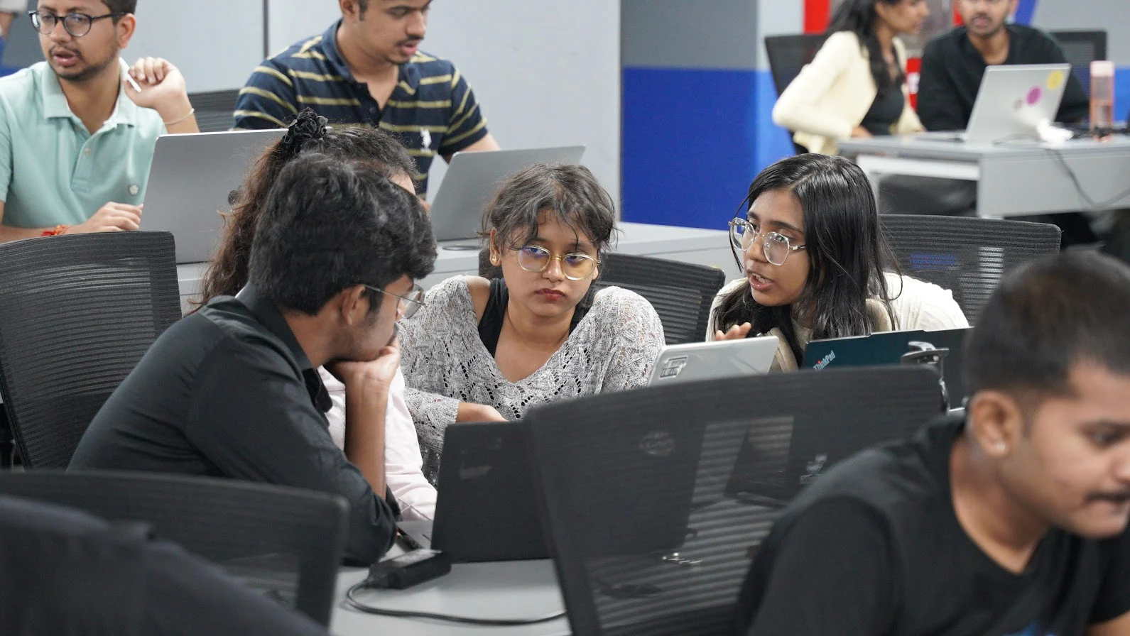 People working together at the Bengaluru Tech Week 2026 Buildathon.